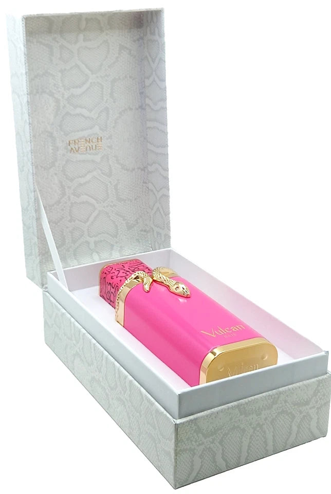 A pink cylindrical cosmetic bottle with gold trim and a gold bow, presented inside an open white patterned gift box. The bottle has a gold label reading 'Nikson' and a pink textured cap.