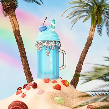 Blue milkshake-shaped container with decorative elements on a tropical background with palm trees and colorful sky.