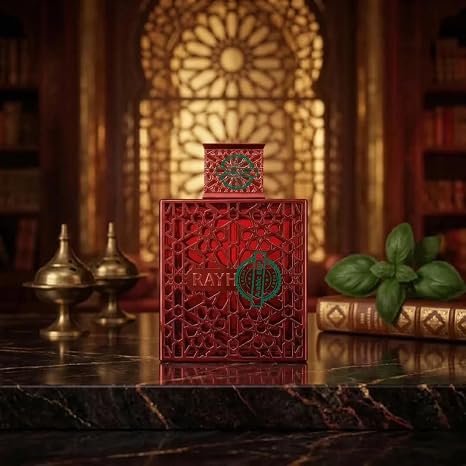 Decorative red box with intricate patterns and 'RAYH' branding on a marble surface with a warm, blurred background.