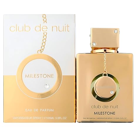 Gold 'club de nuit' Milestone perfume bottle and packaging on a white background