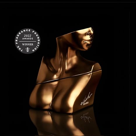Gold perfume bottle with '2022 Fragrance Foundation Award Winner' badge on black background