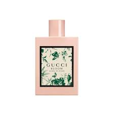 Gucci perfume bottle with floral design on a white background