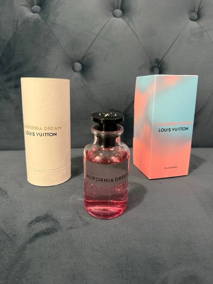 Louis Vuitton perfume bottle with packaging on a gray surface