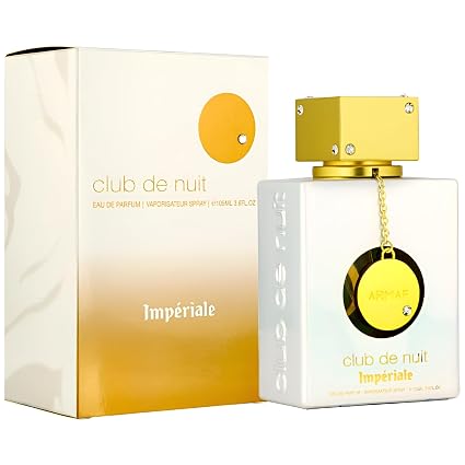 Perfume bottle and packaging with a yellow and white design