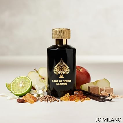 Perfume bottle labeled 'Game of Spades Wildcard' by JO MILANO with fruit and spice elements on a light background.