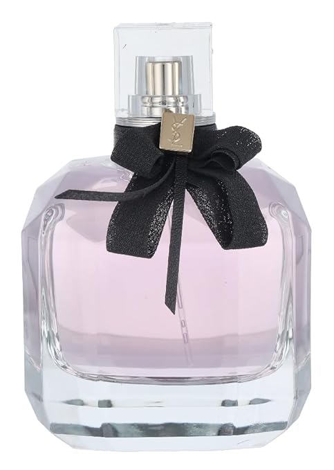 Perfume bottle with a black ribbon on a white background