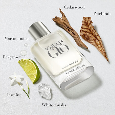 Perfume bottle with natural elements on a light background