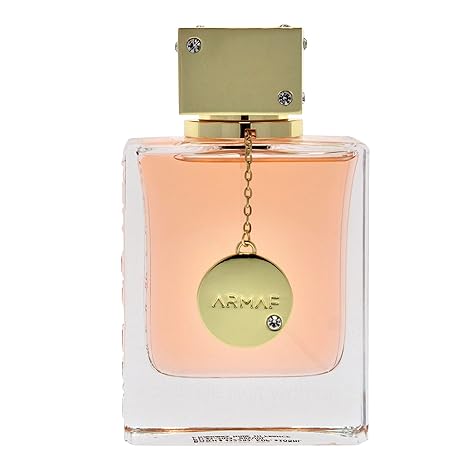 Perfume bottle with gold cap and label on a white background