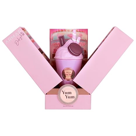 Pink 'Yum Yum' perfume bottle with packaging on a white background