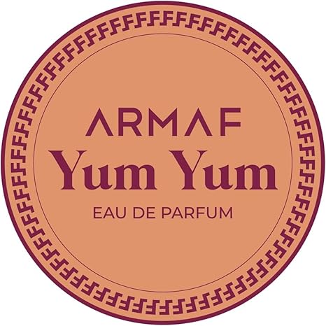 Round label for Armaf Yum Yum Eau de Parfum with decorative border on a peach background