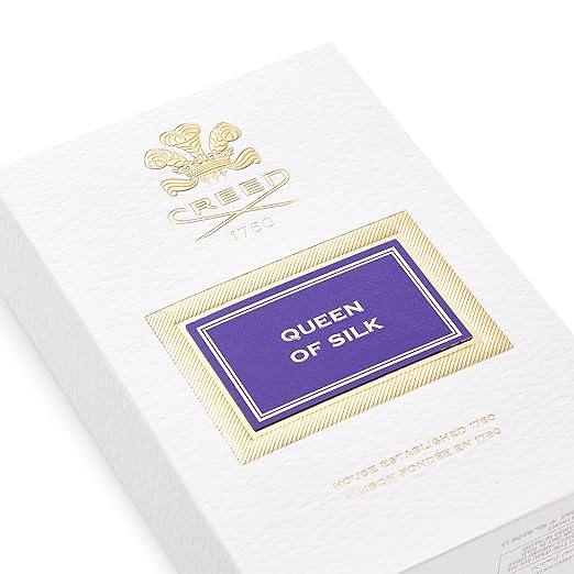 White silk fabric with 'Queen of Silk' label and brand logo on a white background